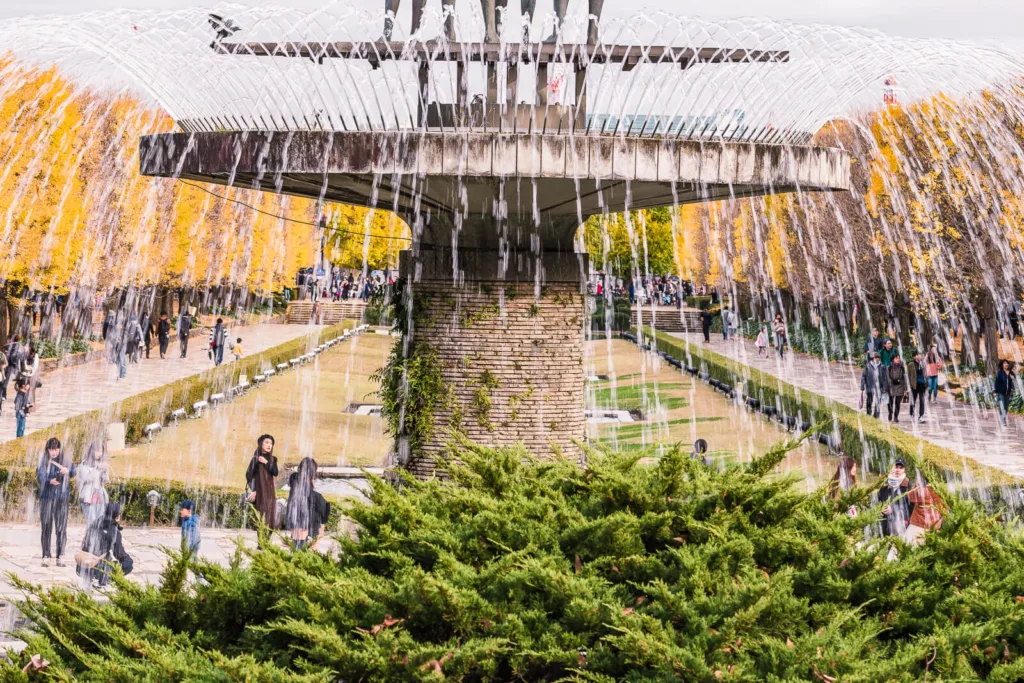 A fountain in the foreground at Showa Kinen Park