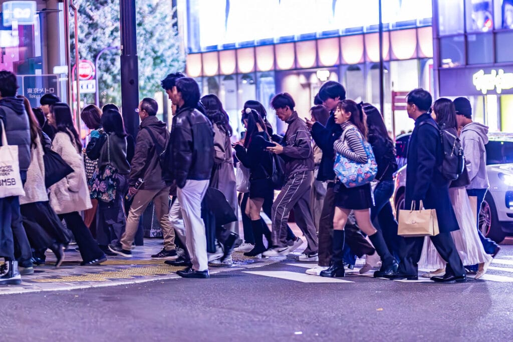People crossing the street in Harajuku.