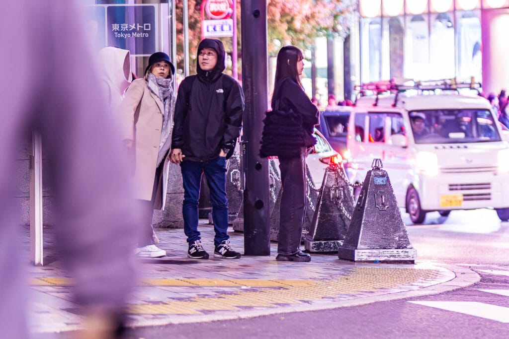 People waiting at the red light at Harajuku.